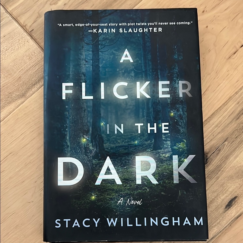 A Flicker in the Dark Hardcover Book